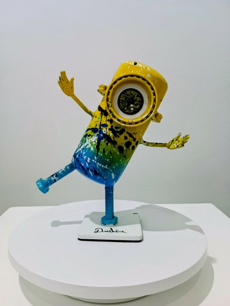 Minion Pollock -20 x 20 x 10 cm