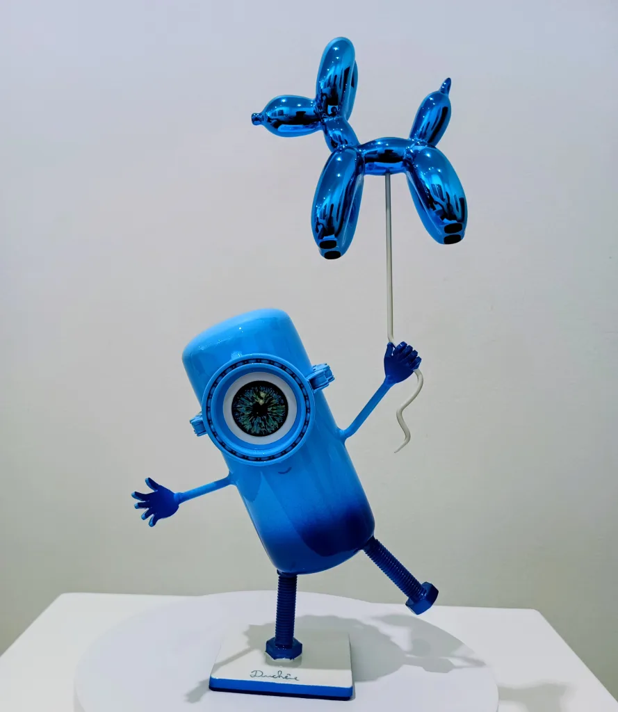 Petit Minion Koons (bleu, socle rectangulaire Blanc) — Vincent Duchêne